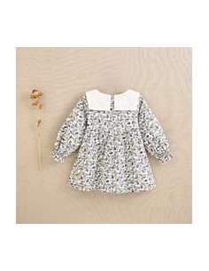 Vestido de bebé niña con estampado de hojas azul y mostaza con cuello babero blanco 2