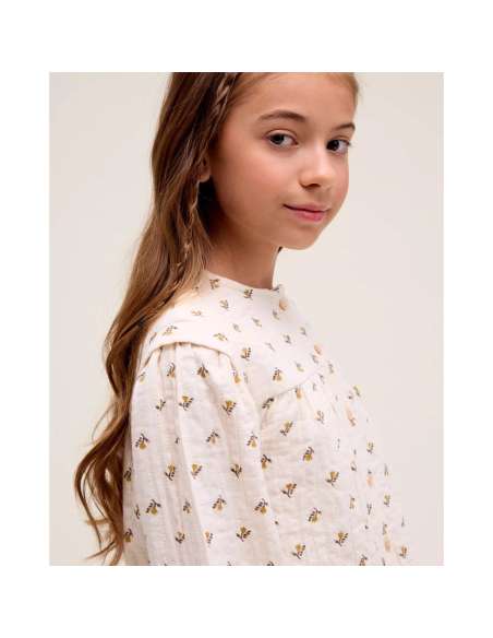 Blusa de niña beige con estampado floral